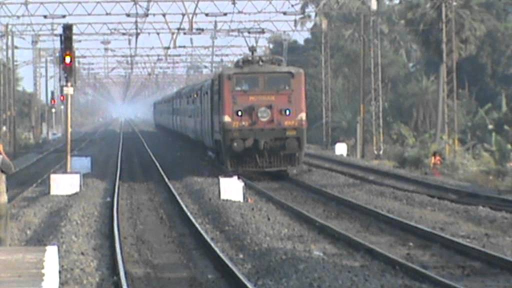 Whining ex.WAP-6 tears tracks apart with Ballia Express and chases freight