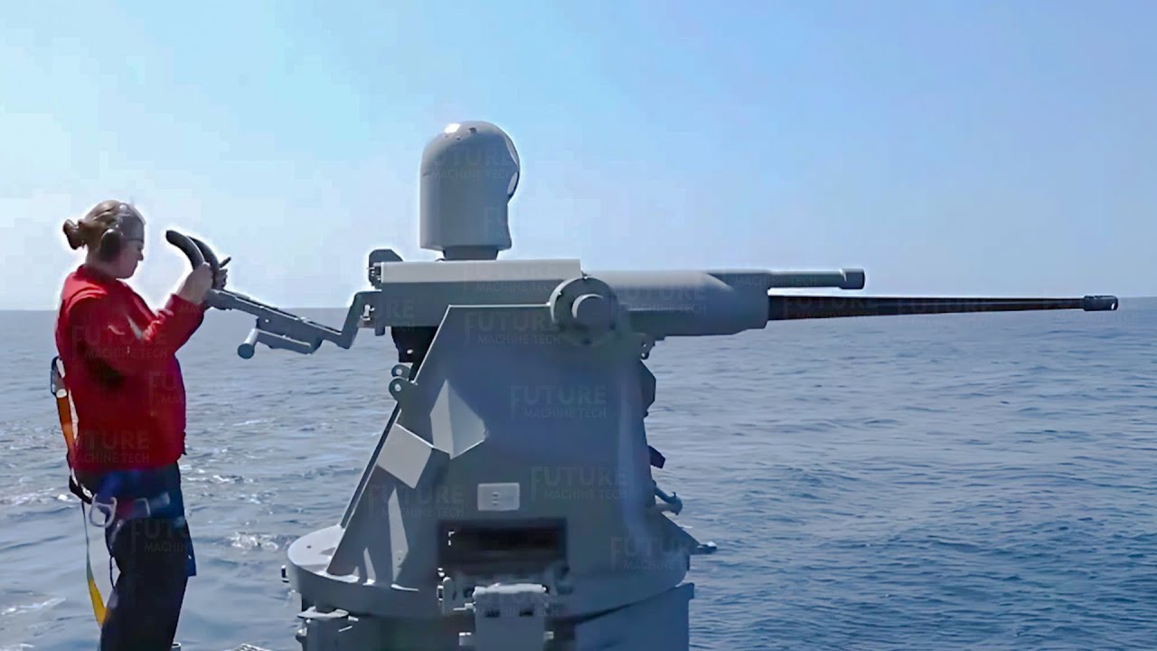 US Navy Female Shows Skill Holding a Mk-38 25mm Chain Gun During Live Fire Exercise