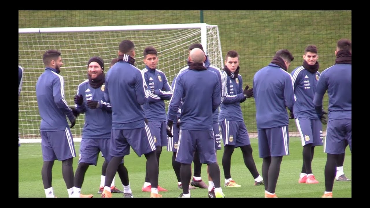 Argentina squad greet Messi with hugs on his return to training
