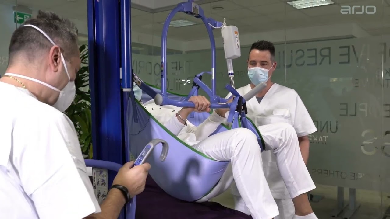 MaxiSlide™ - Inserimento del corsetto I Patient Handling I Arjo Italy