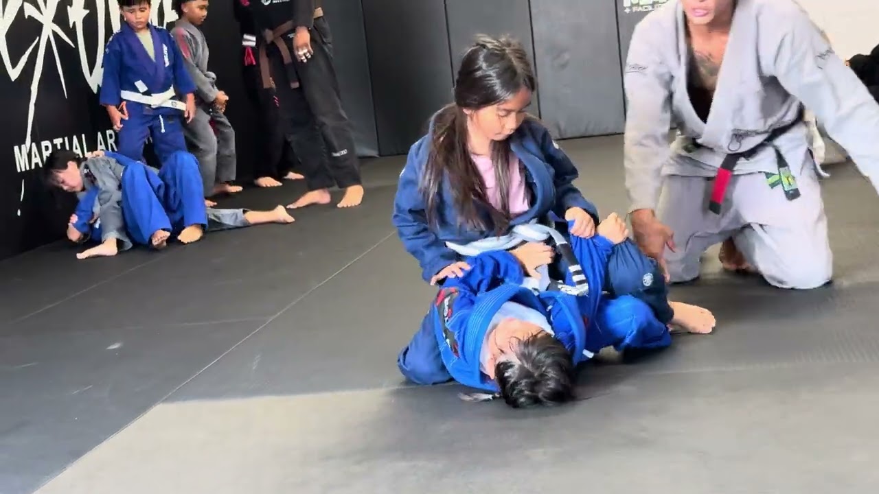 3/12/25. Lanvy (in Gray) vs. a bigger boy (in Blue).