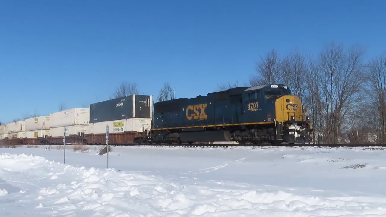 Solo CSX Container Train with a DPU going through Sterling, Ohio on January 31, 2026