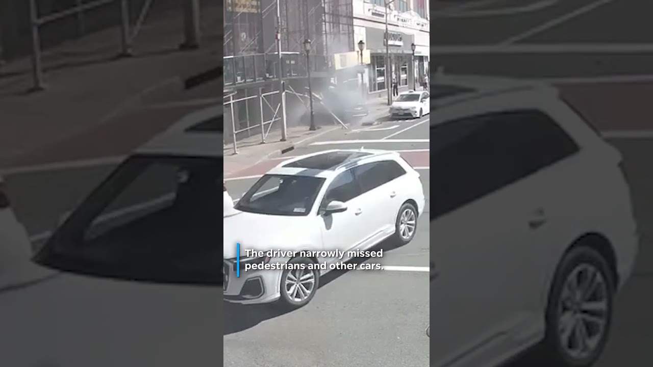 Out-of-control SUV slams into scaffolding. See surveillance video.