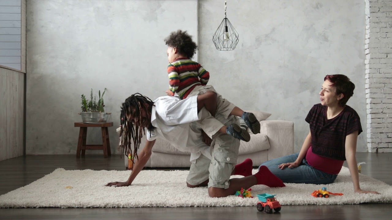 Stock Footage of a Family having fun around the House