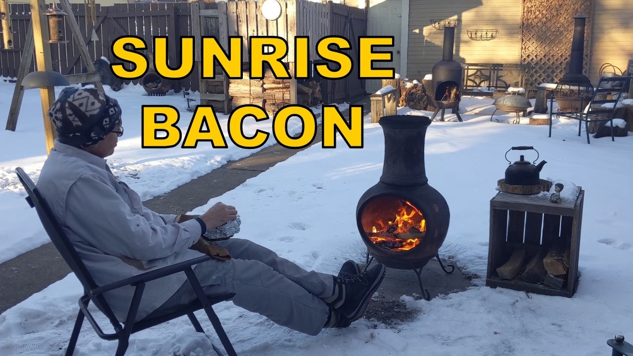 Frying bacon over winter chimineas at sunrise