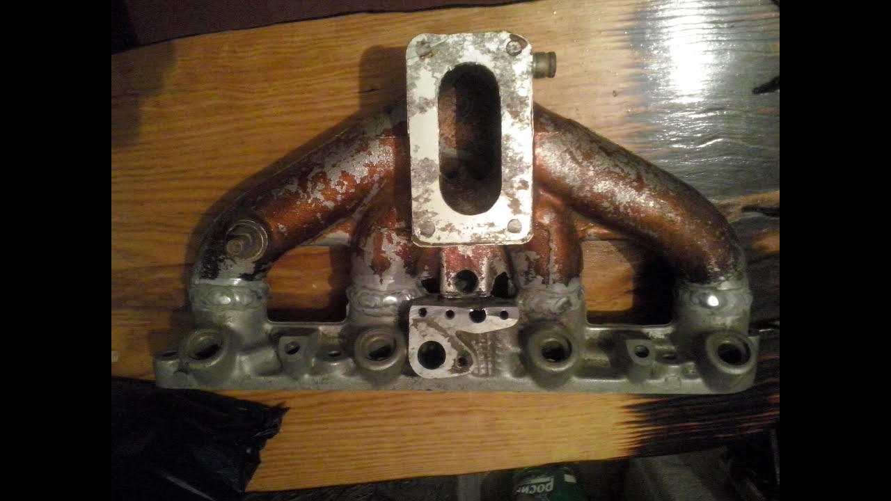 Коллектор под карбюратор уже установлен  Мерседес 190 W 201