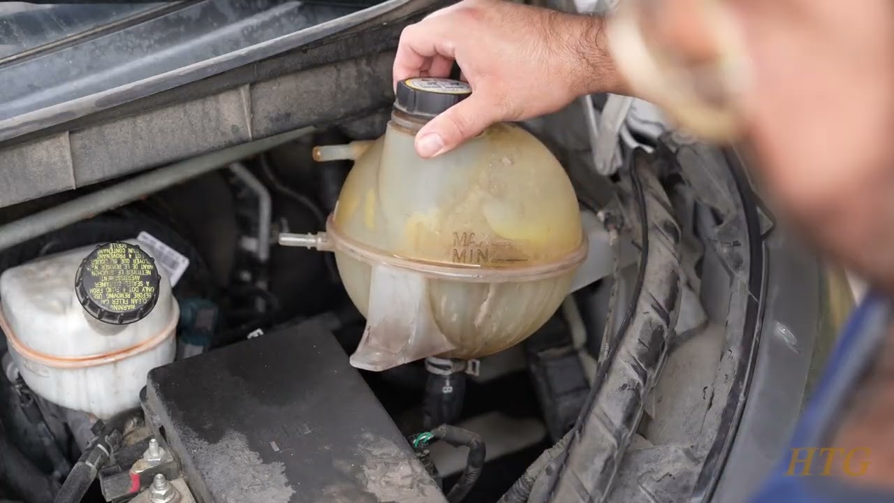 Ford Transit 150 Coolant Reservoir and Hose Replacement