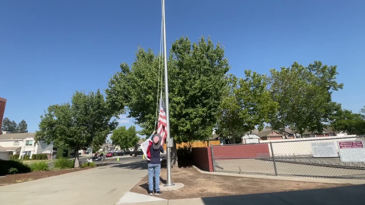 Lowering the Flags at Maeola R. Beitzel Elementary School