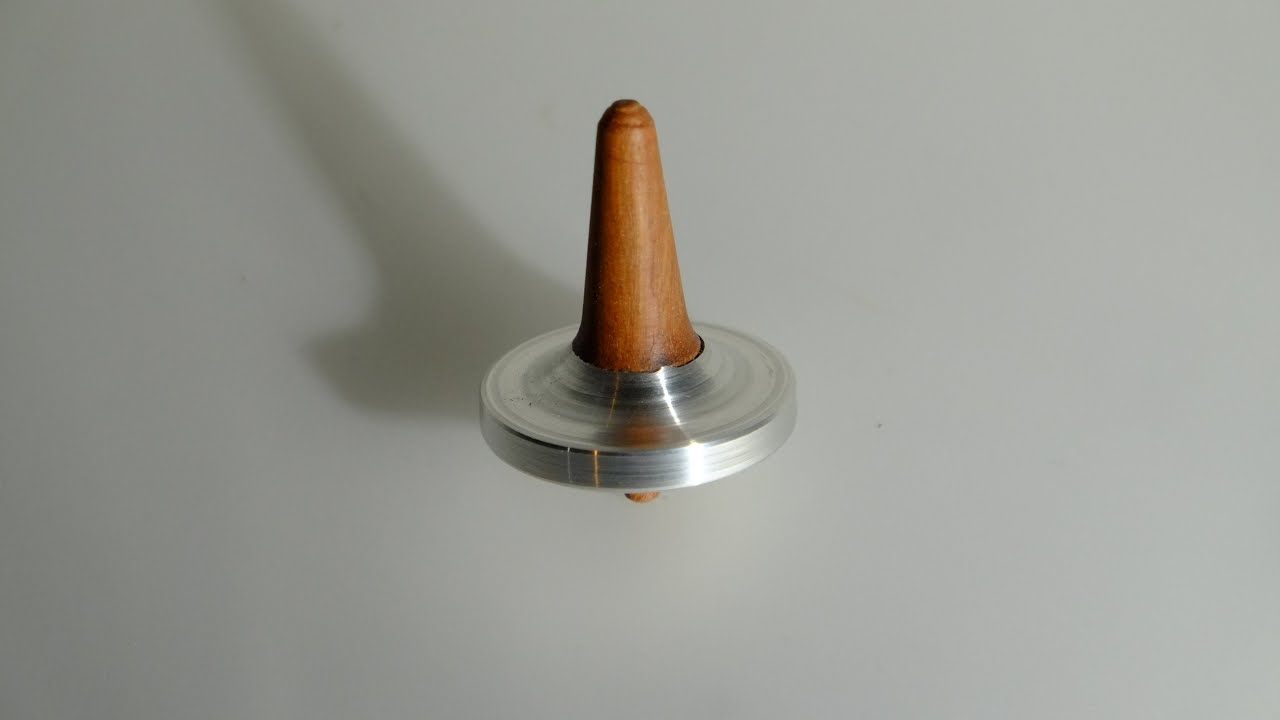 Woodturning  -  making a pewter  spinning tops #woodturing #pewter