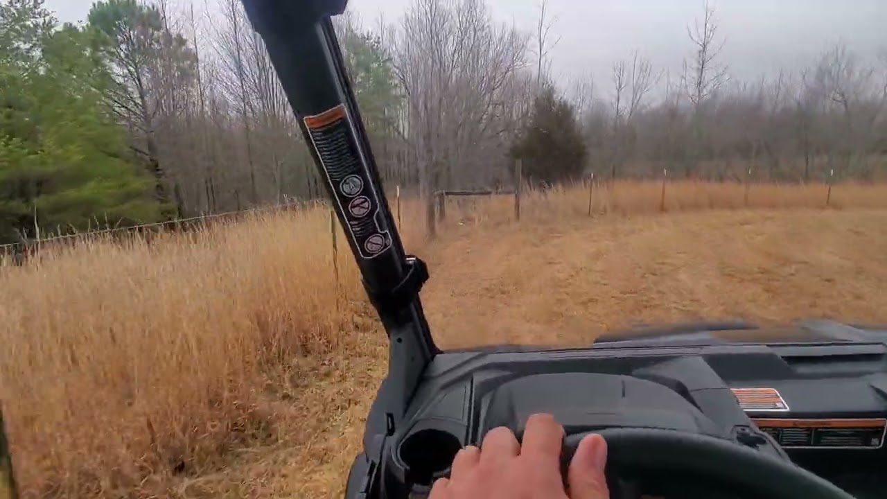 Can-Am defender XT HD9 inside 20 acres
