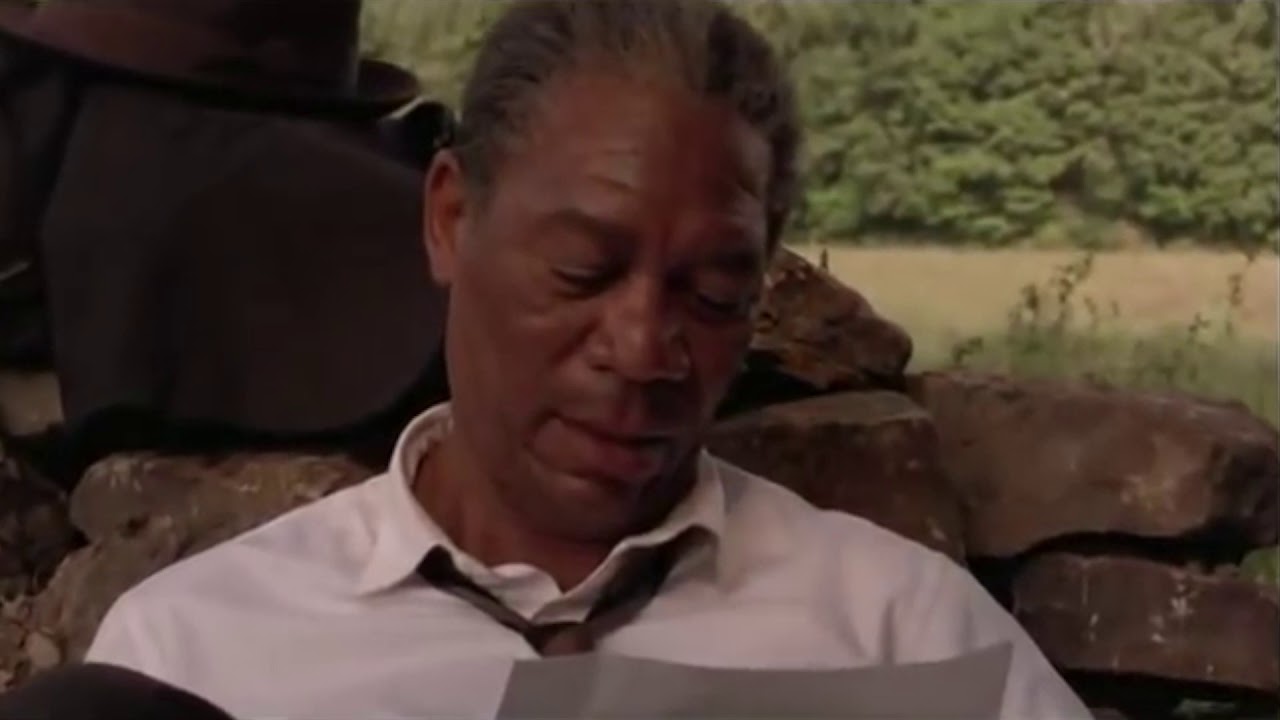 Ellis Boyd 'Red' Redding reads a letter from Carl Spackler