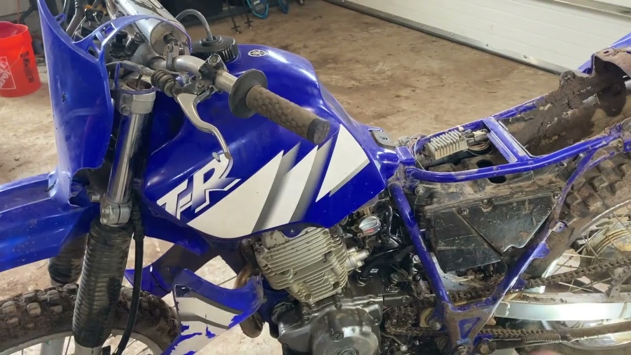 How to remove the carb on a Yamaha TTR 225 Dirtbike in under 10 minutes.
