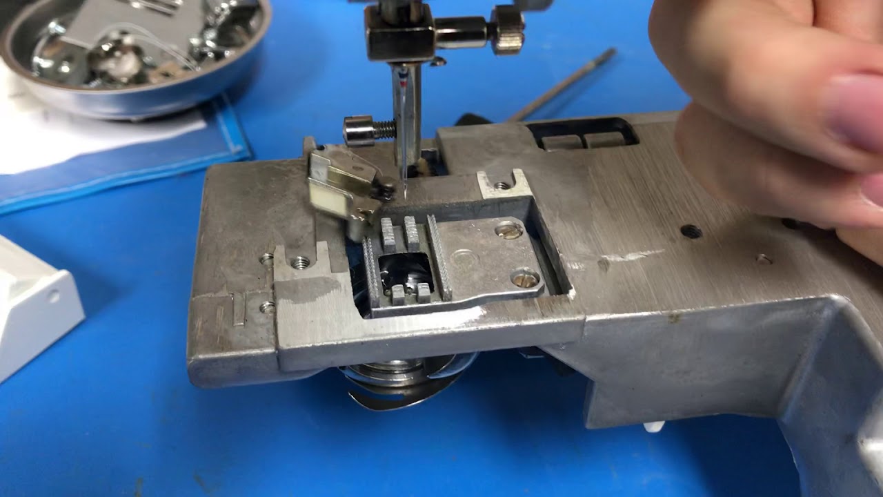 Inspecting sewing machine hook timing