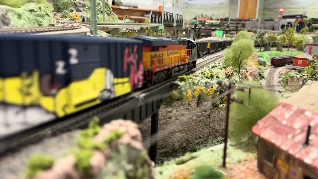 Scale Trains CSXT Chessie Systems Heritage Unit #1973 pulling a short freight.