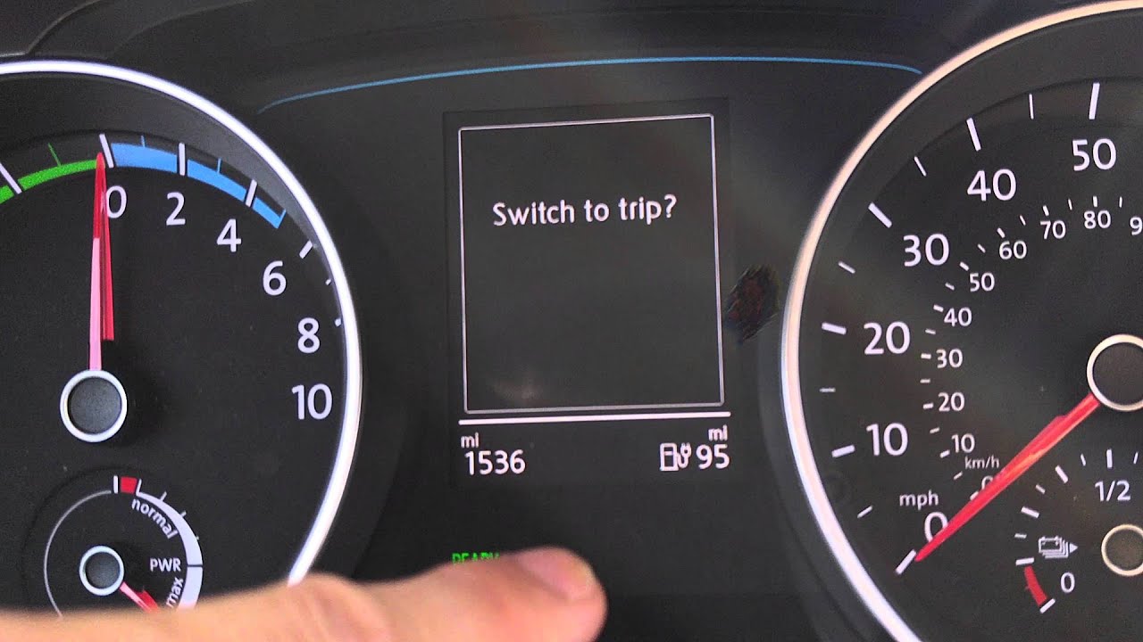 How to toggle the odometer switch in the 2016 Volkswagen egolf