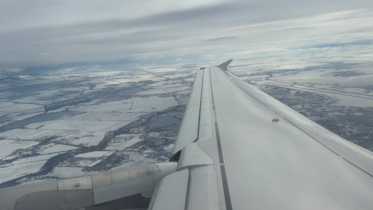 SWISS Airbus A320 snowy takeoff at Sofia Airport