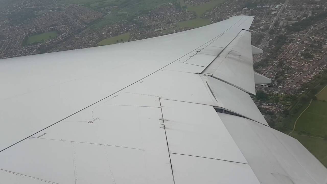 AA 777-200 LHR Heathrow Take Off Wing View
