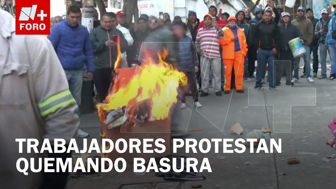 Personal de limpia tira y quema basura afuera de oficinas de la CDMX - Expreso de la Ma&ntilde;ana