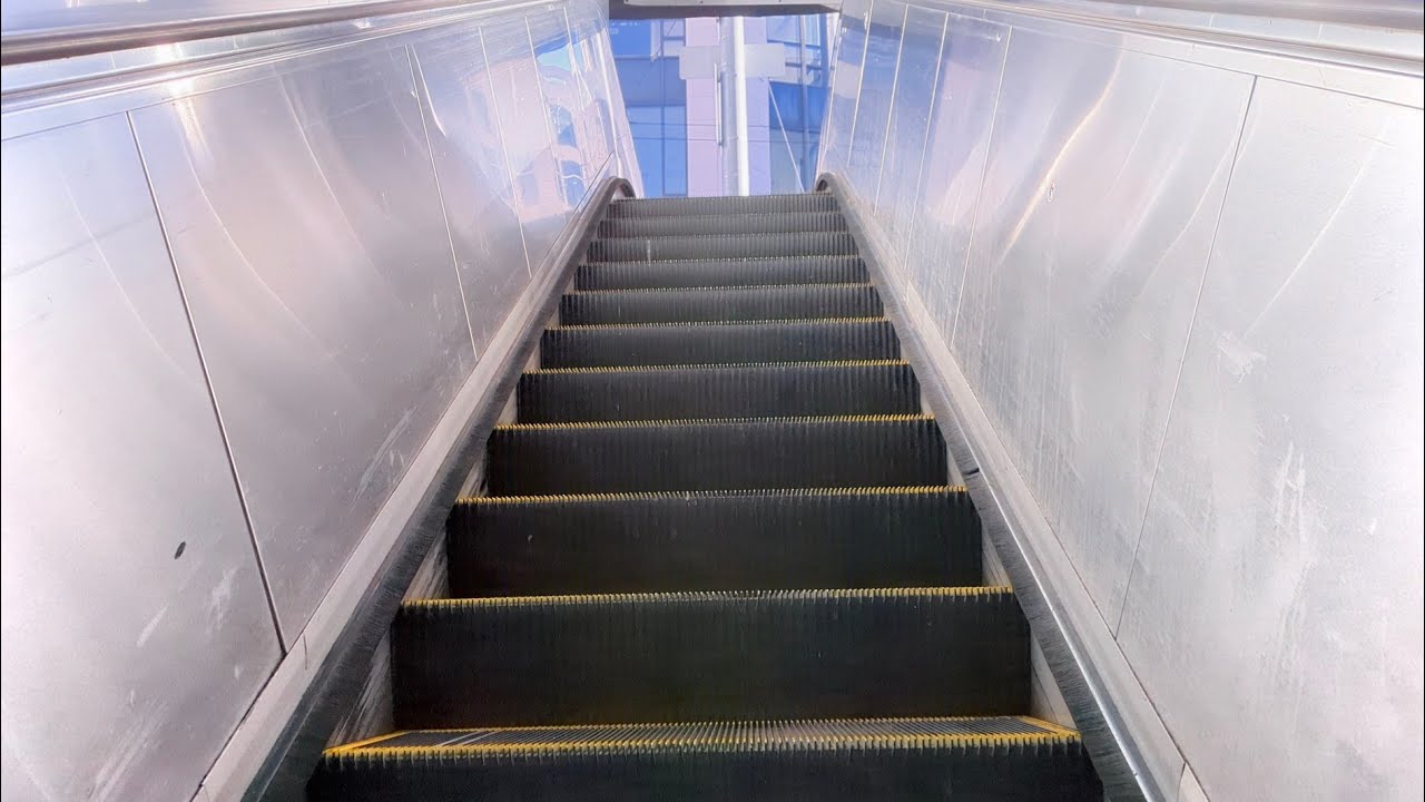 Schindler Escalators to Street - Union Square Muni Station - San Francisco California