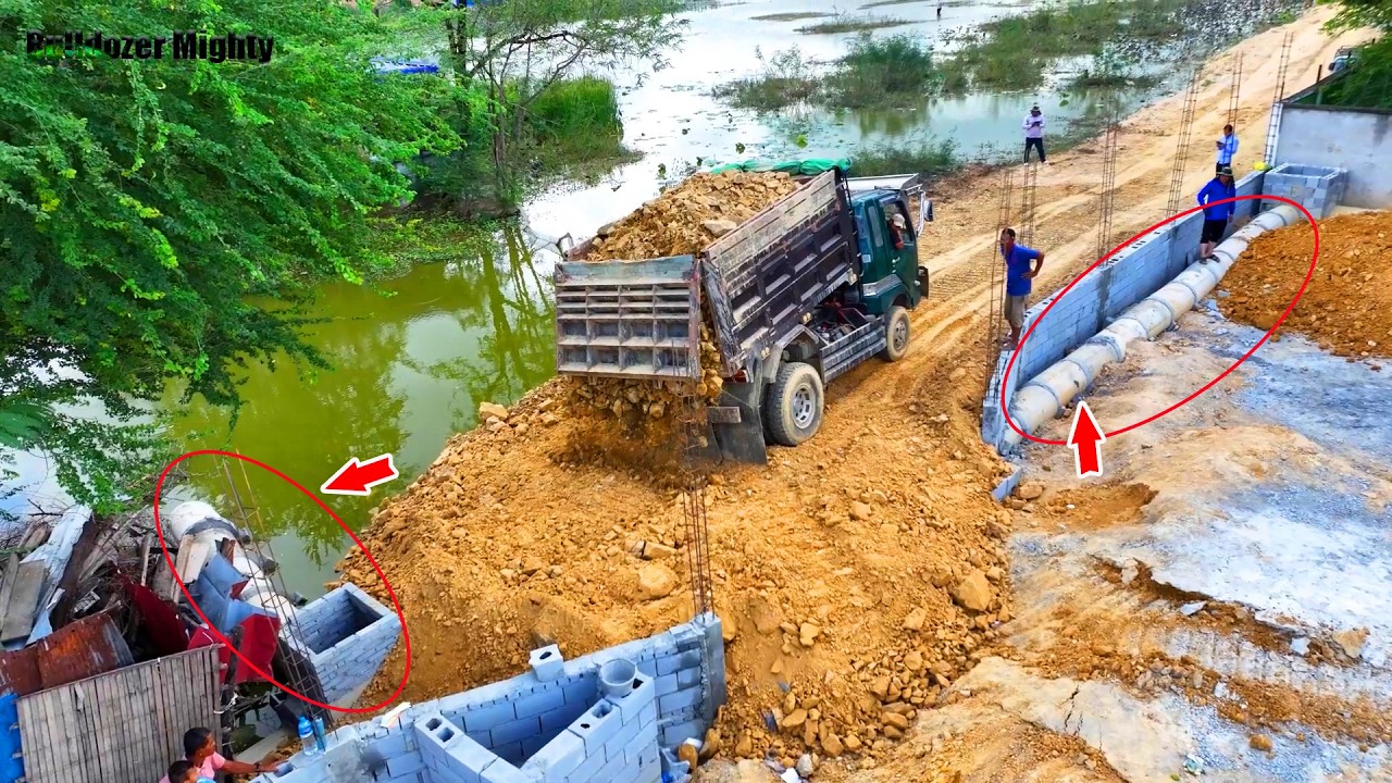Bulldozer KOMATSU D53p Push Soil & Stone to fill a concrete pipe, Full Filling Up The Land