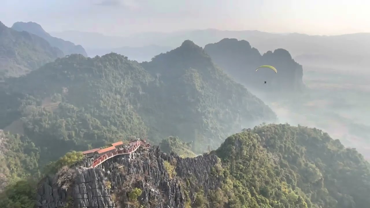 Powered paragliding over Vang Vieng, Laos