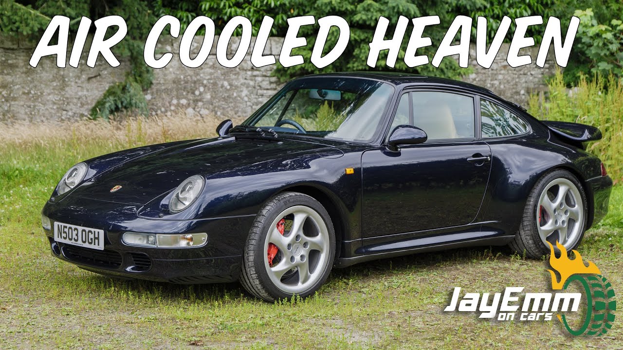 АВТОМОБИЛЬ: темно-синий Porsche 993 911 Turbo — классическое немецкое совершенство