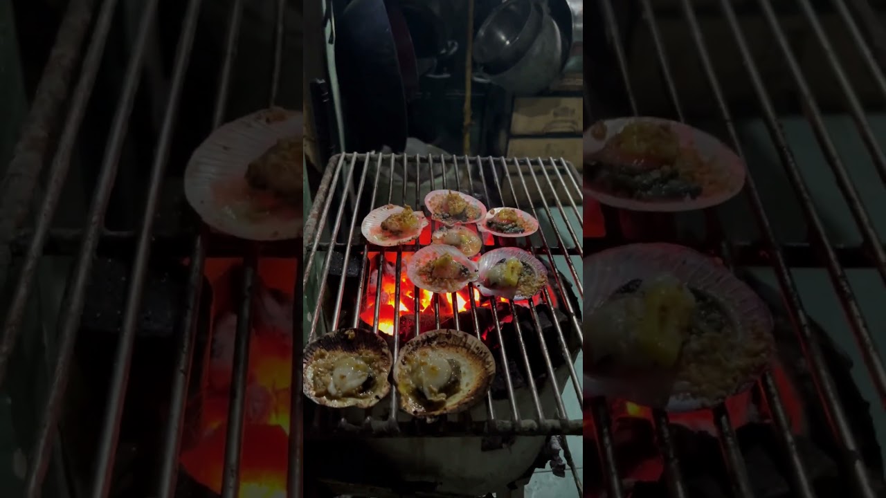 Buttered Garlic Scallops on a smoking hot grill