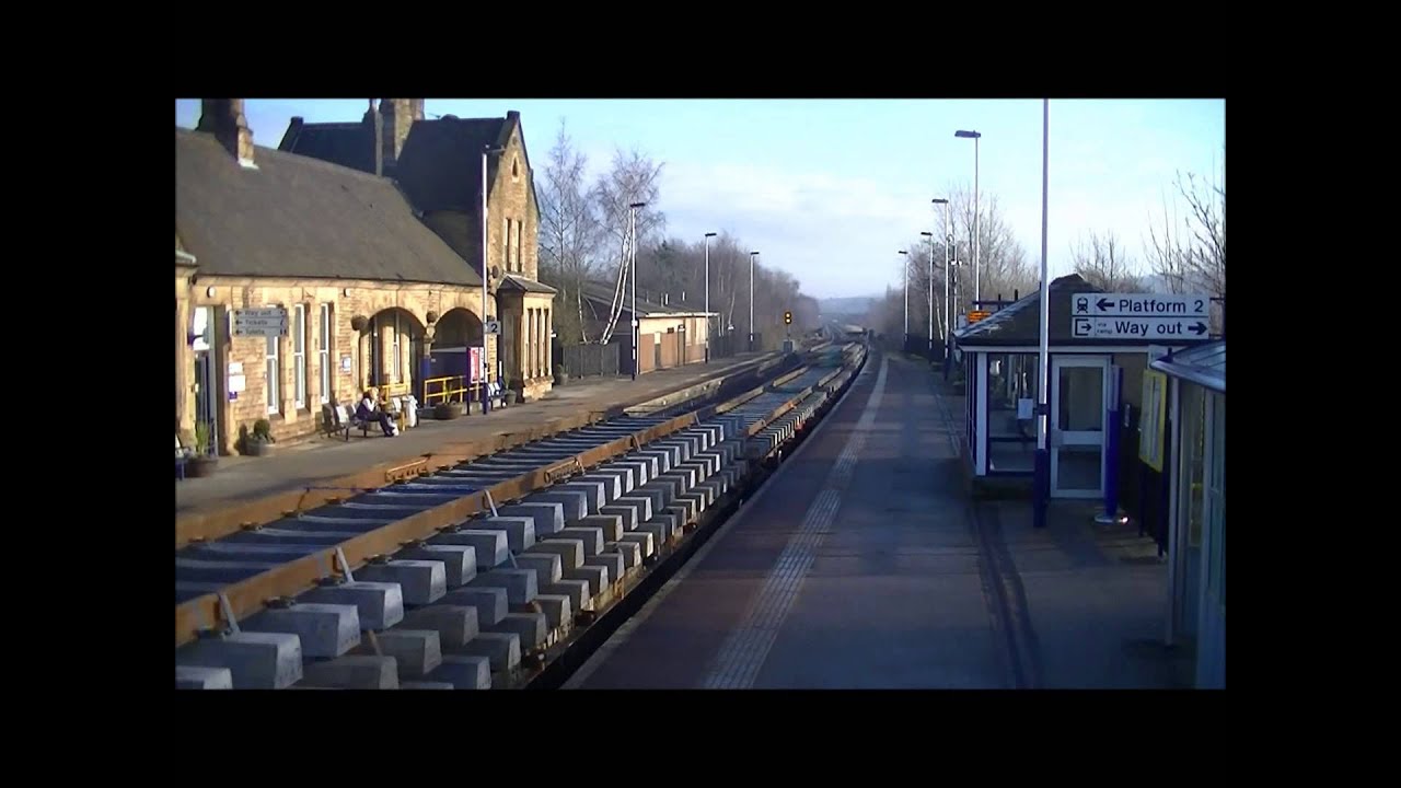Southbound Freight at Mexborough including 66111 and 66168 stopping.