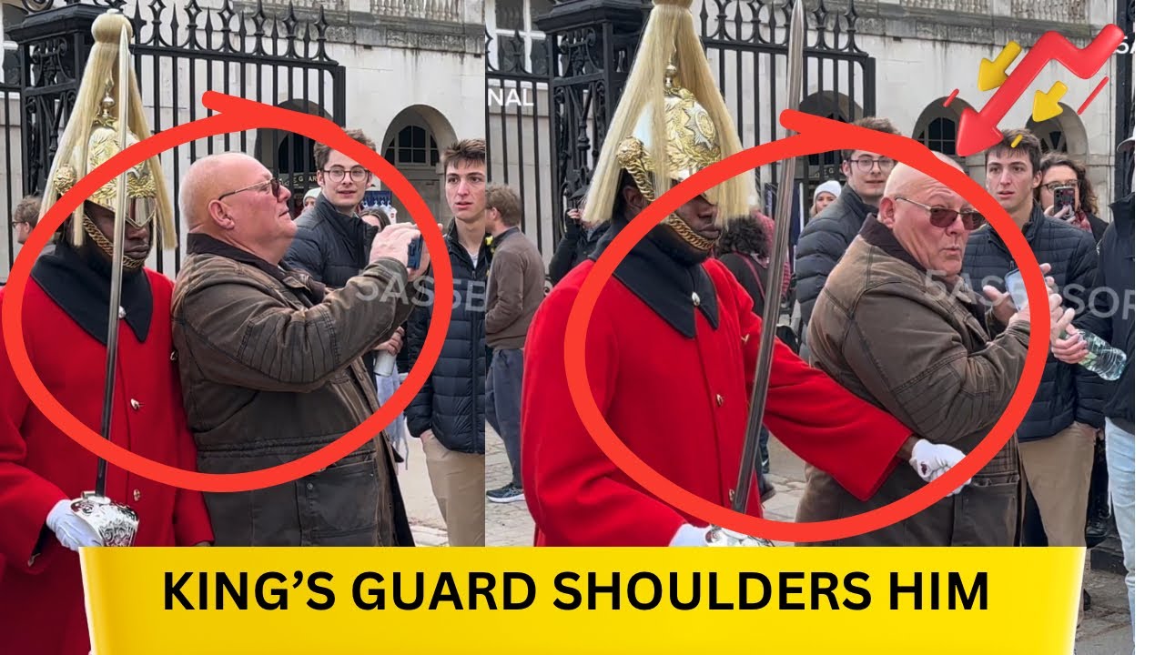 KING’S GUARD SHOULDER BUMPS A MAN AND THEN USES HIS ARM TO MOVE A WOMAN OUT OF THE WAY!