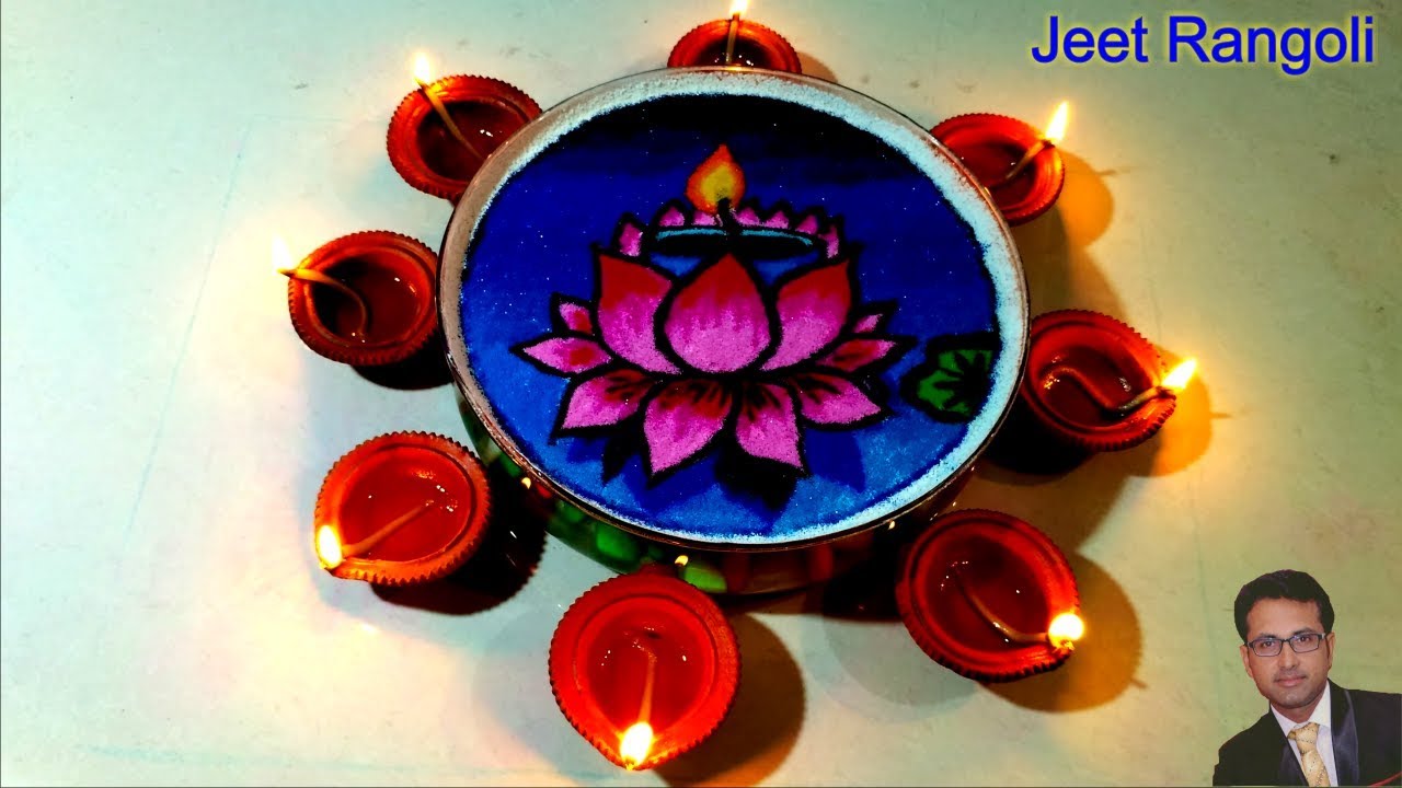Diwali special rangoli on water surface. Lotus rangoli on water.