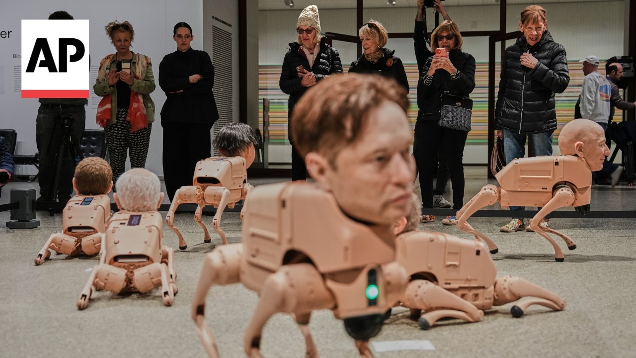 Elon Musk and Mark Zuckerberg robot dogs at Beeple exhibit in Germany