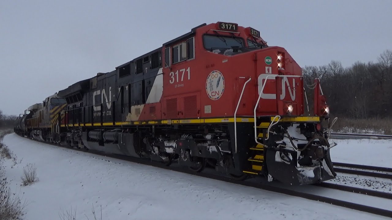 CN 3171 leads a mixed freight Southbound just south of Fond du Lac, WI