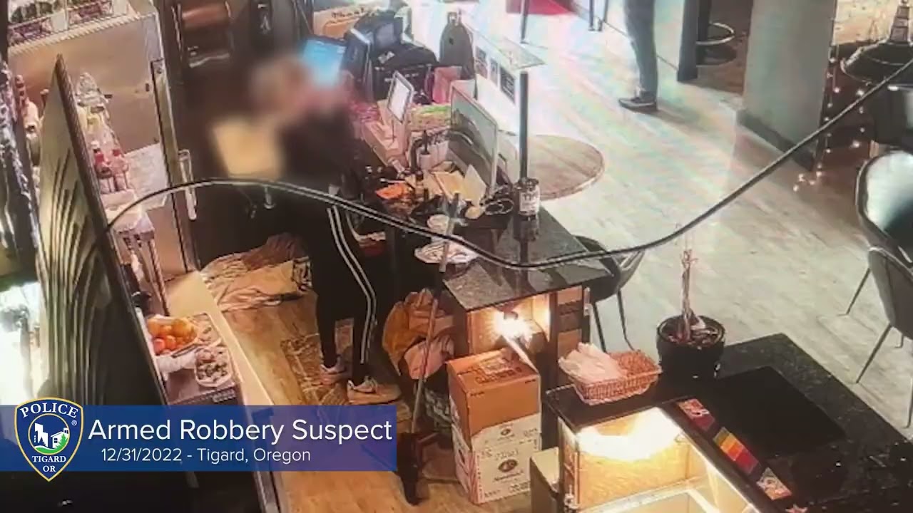Surveillance Video: Armed Robbery Suspect
