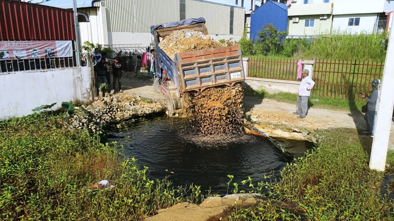NEW Landfill Project: Dump Truck Dumping Rock Into Deep pond | Bulldozer Pushing into Water