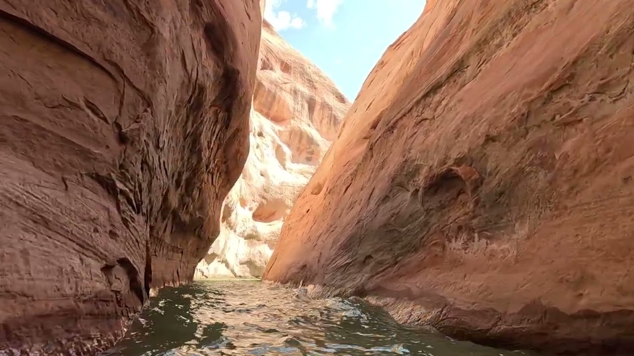jet skiing seadoo through lake powell slot canyons