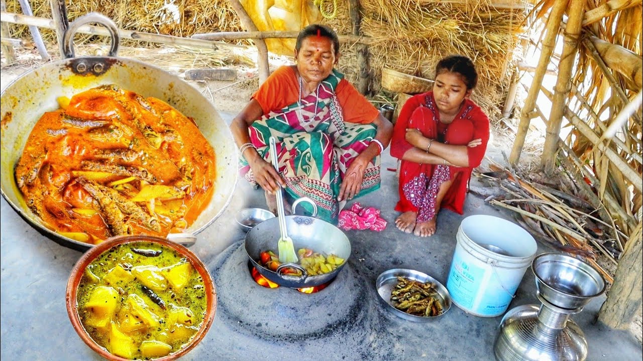 small fish curry with potato & mango chatni cooking by our santali tribe grandmaa