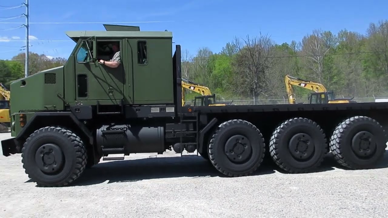 Oshkosh M1070 24 ft Flat Bed 8x8 truck C&C Equipment