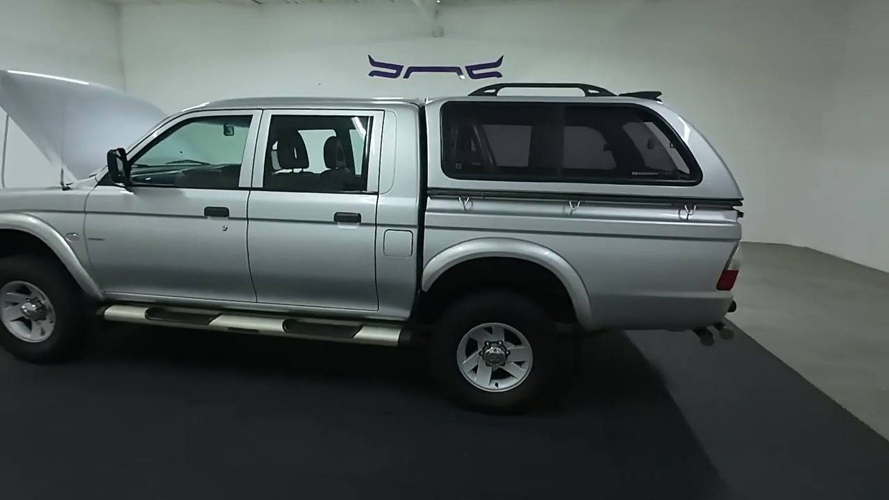 Mitsubishi Colt 2400I Rodeo 2004 года выпуска