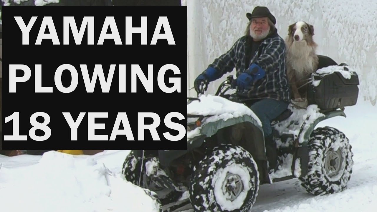 ATV Plowing snow Old Yamaha 350 Kodiak going strong after eighteen years.