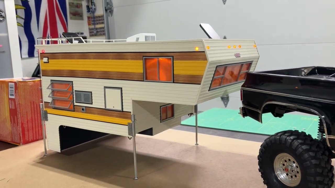 Traxxas TRX4 High Trail Chevy Blazer and slide in 70's camper.
