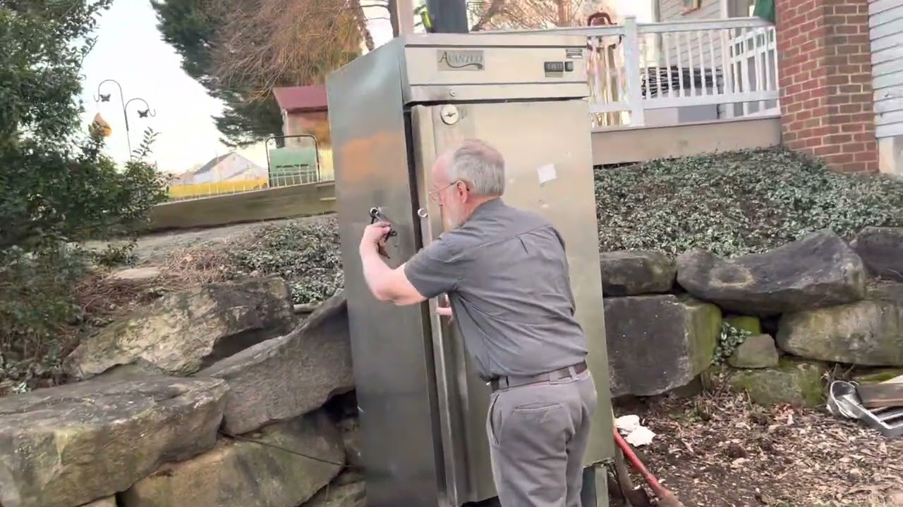 Smoke house repurposed from a refrigerator. Stainless steel inside and outside. Racks all stainless