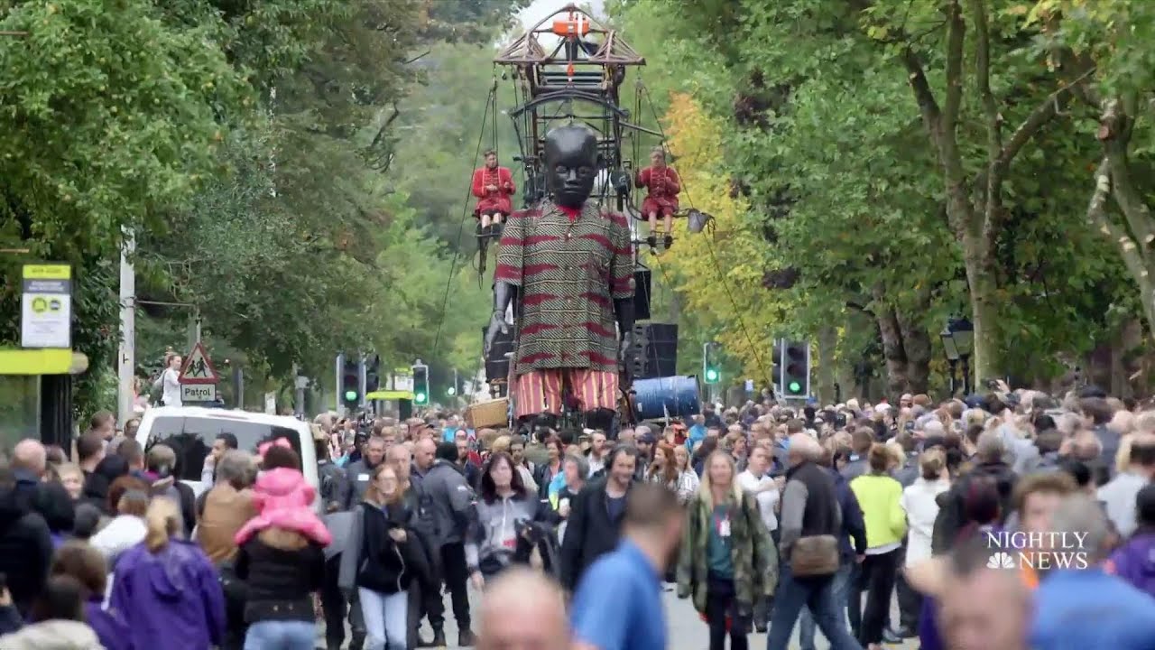 Giant Marionettes Roam The Streets Of Liverpool, Enthralling Onlookers | NBC Nightly News