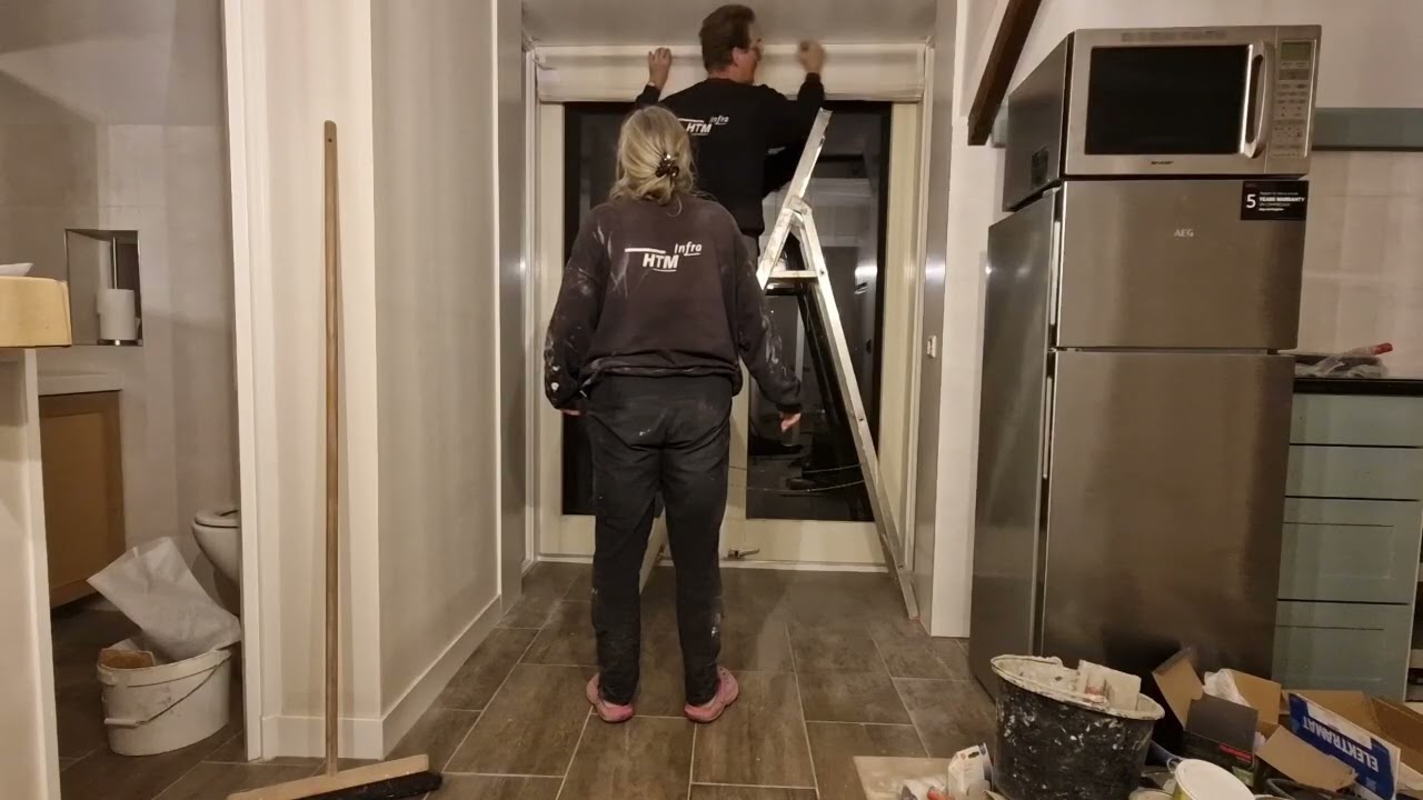 Gordijnen ophangen 