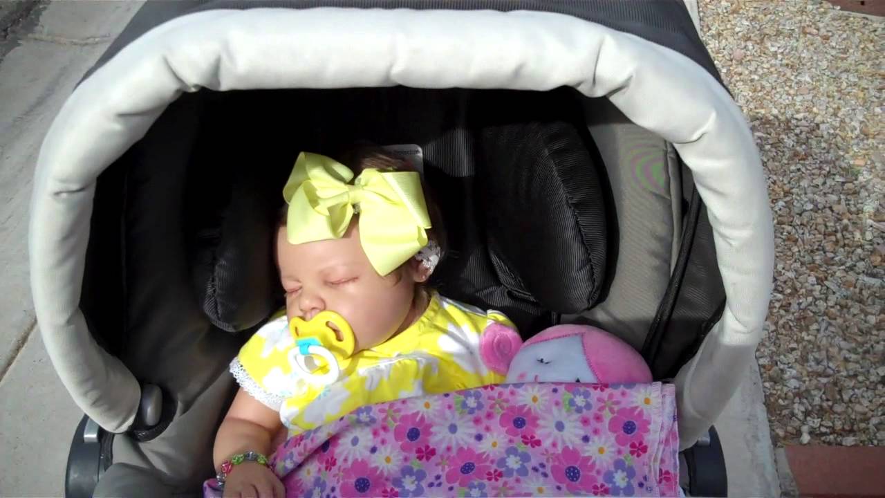 Taking reborn Jasmine for a walk.