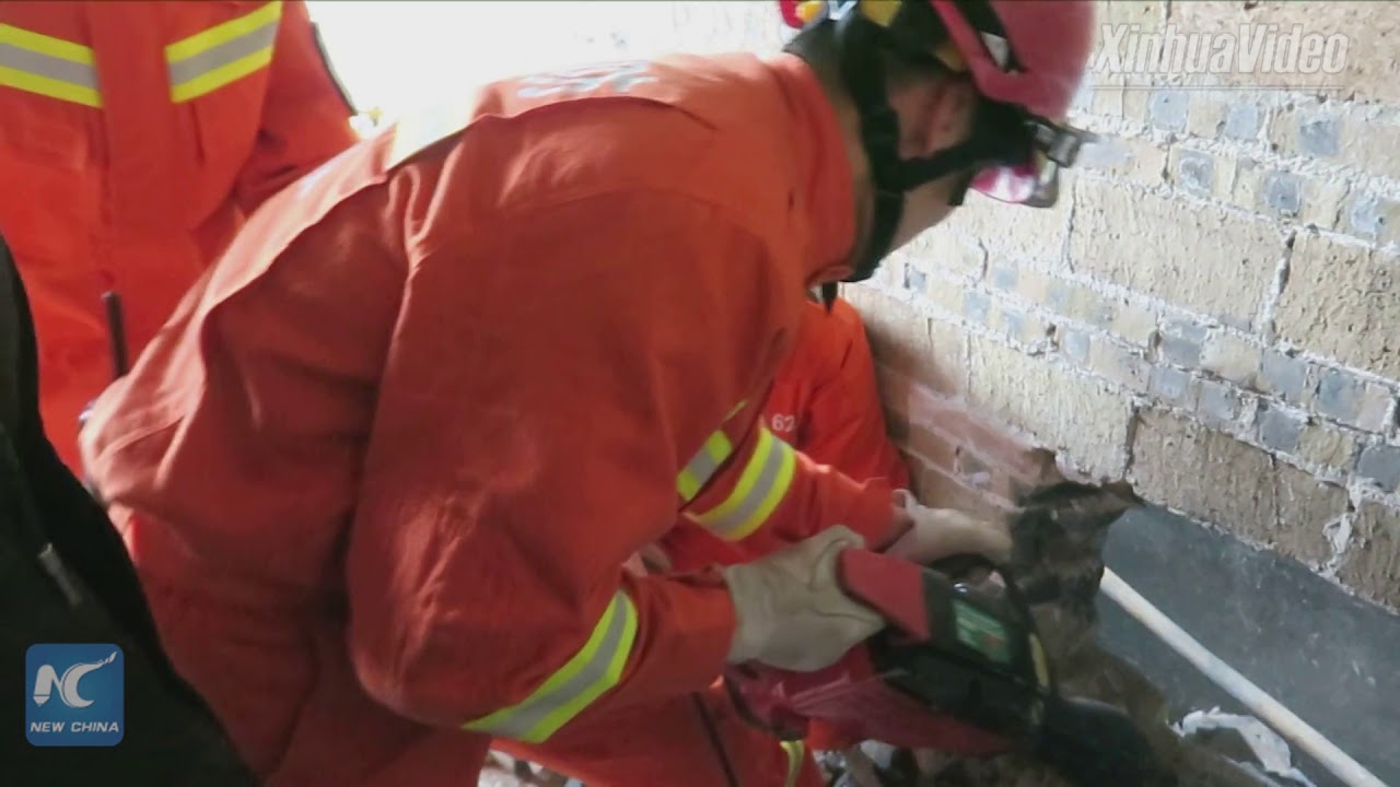 Rescued! Toddler stuck between walls pulled out by Chinese firefighters