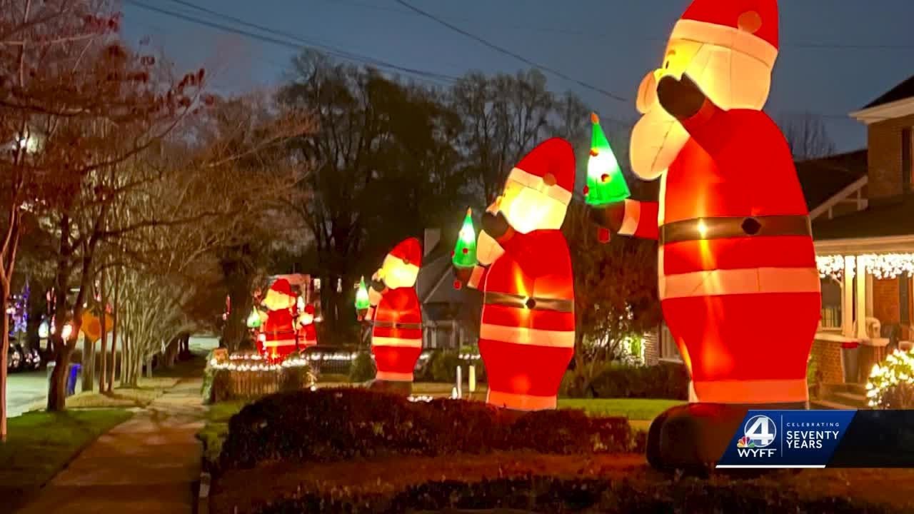 'Go big': 40 huge inflatable Santas line one street in Greenville and it's quite a sight to see