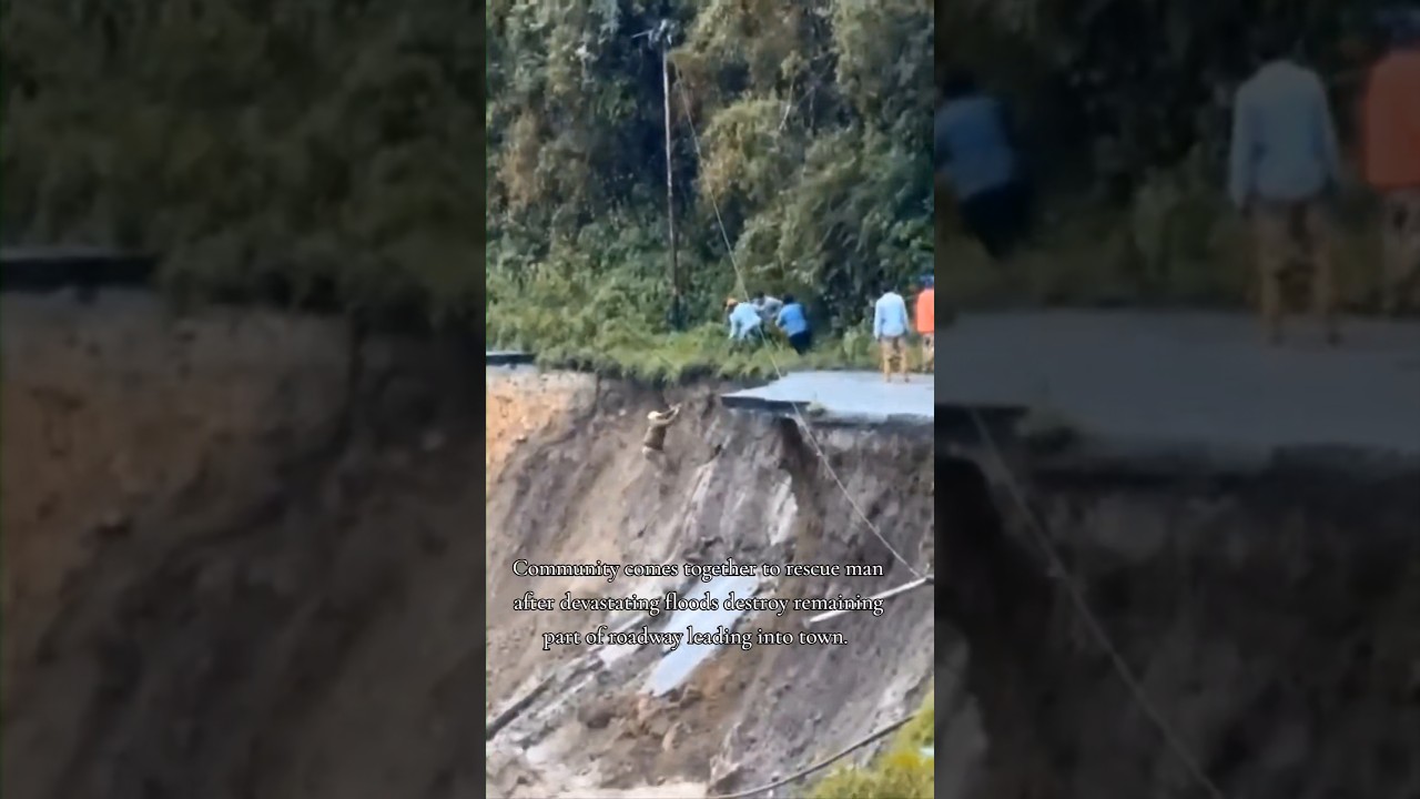 community comes together to rescue man after #floods destroy part of roadway leading into town #hero