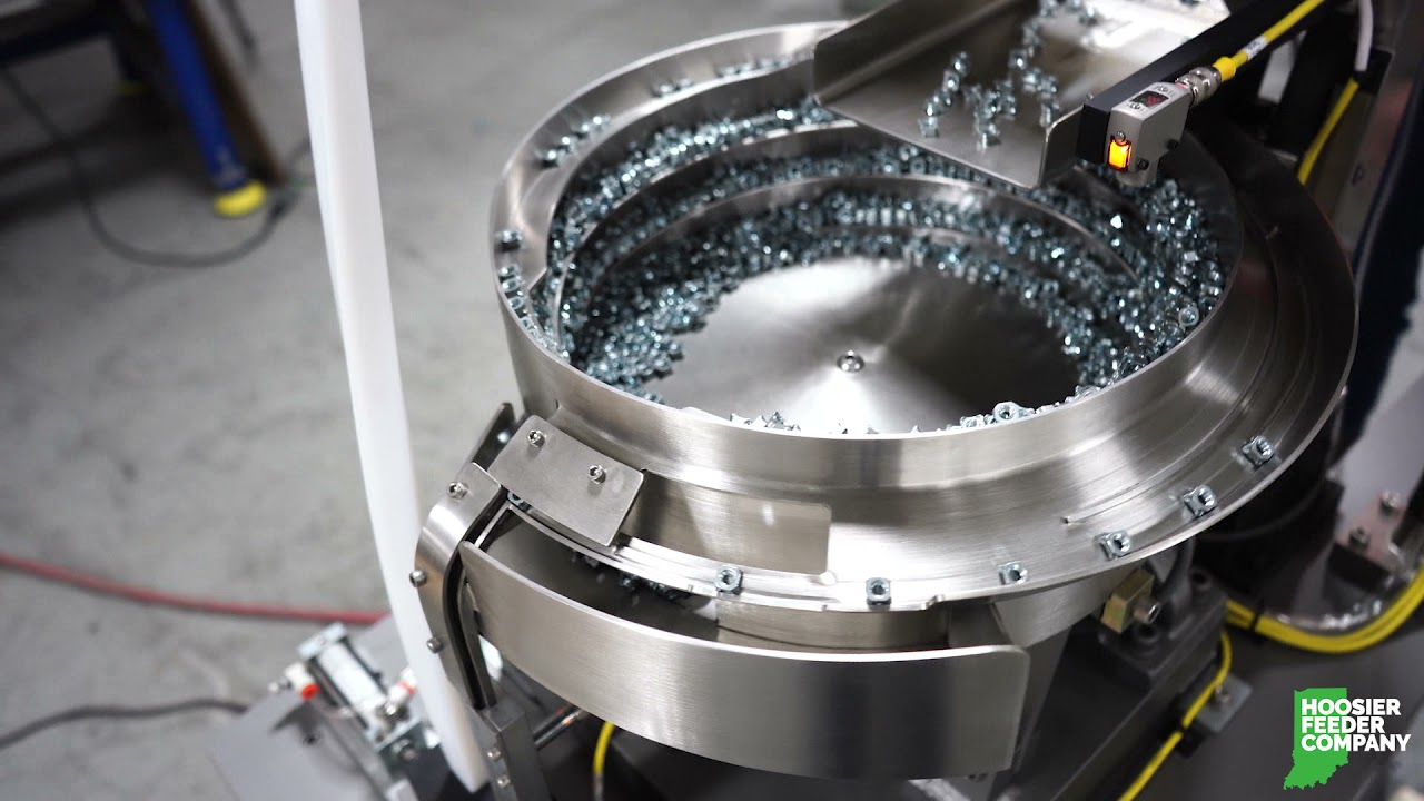 Nut Placement Feeder System for Weld Cells