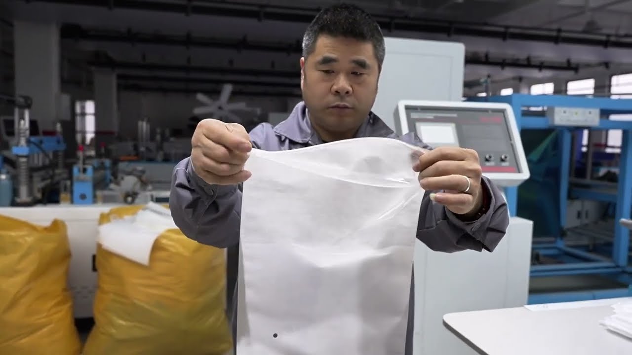 ZXL-H800 Non Woven Zipper Bag Making Machine | 3-Layer Feeding in Action