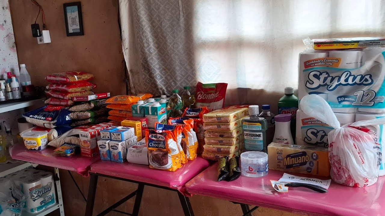 Compras de dezembro (reposição) $500,00 reais para 3 pessoas.